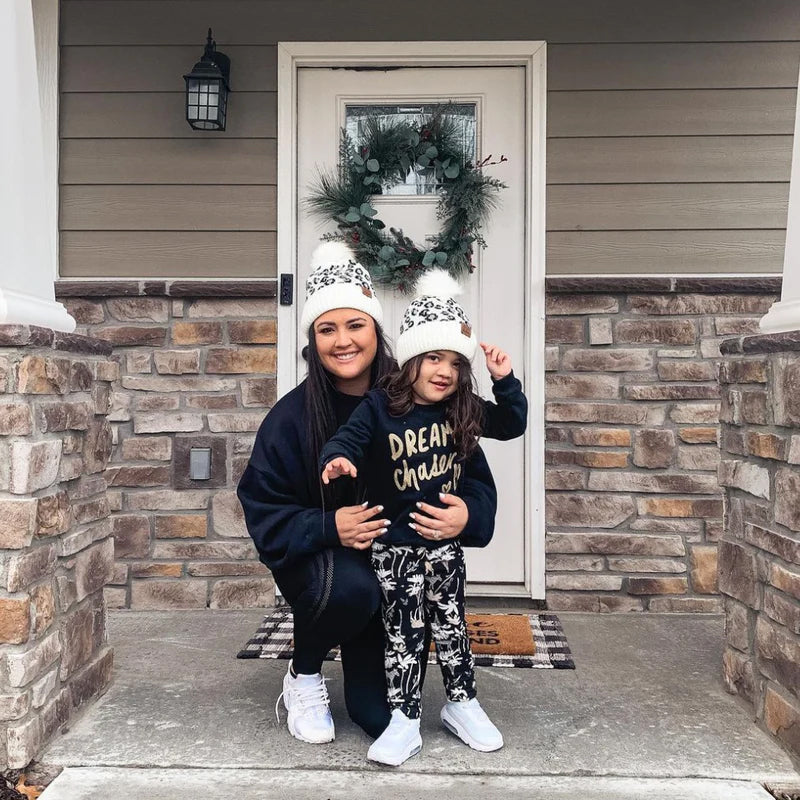 Snow Leopard Print Slouchy Beanie with Faux Fur Snap Pom Pom | Headbands of Hope